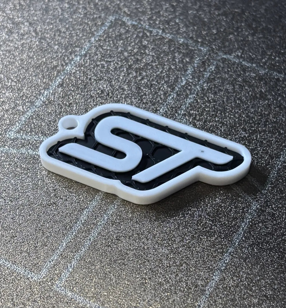 Ford stílusú fekete-fehér kulcstartók